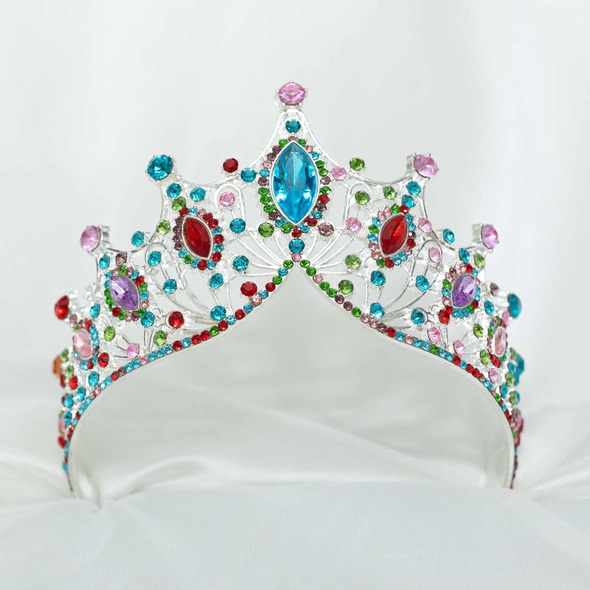 Colorful tiara with gemstones on a white background