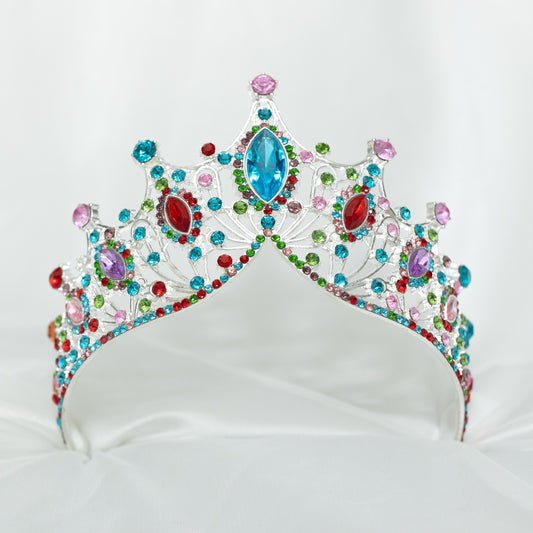 Colorful tiara with gemstones on a white background