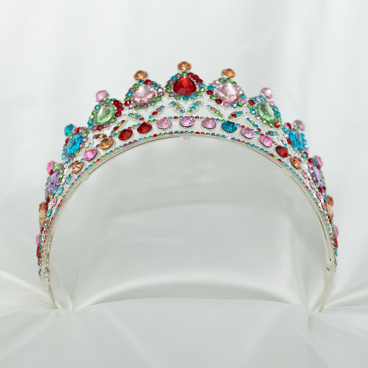 Colorful gemstone tiara on a white background