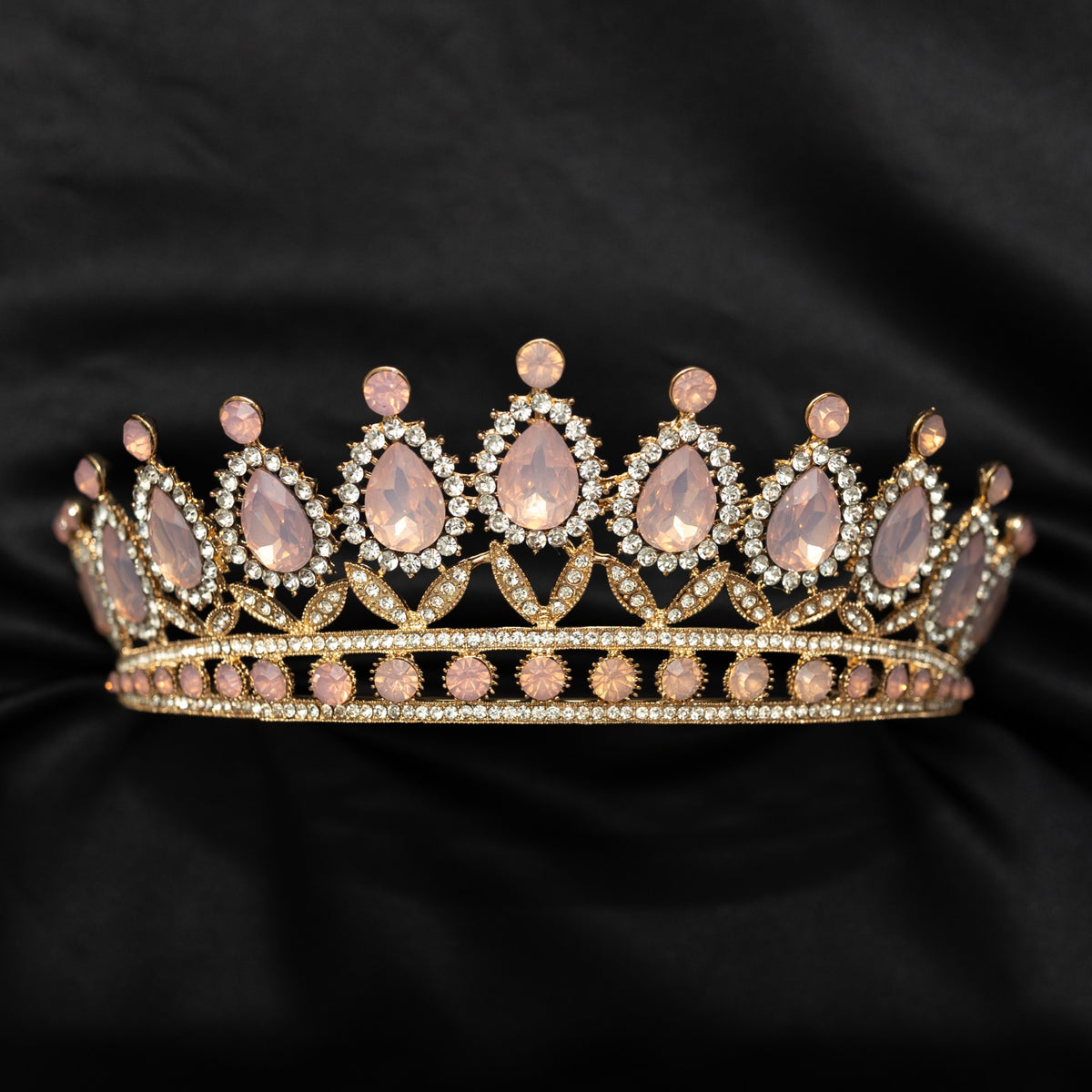 Pink opal & gold tiara on black back ground