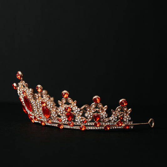 Ophelia's Tiara in Red & Gold - Tear Drop Red Central red stones with circle red stones and small clear stones throughout set on yellow gold color metal - Side View
