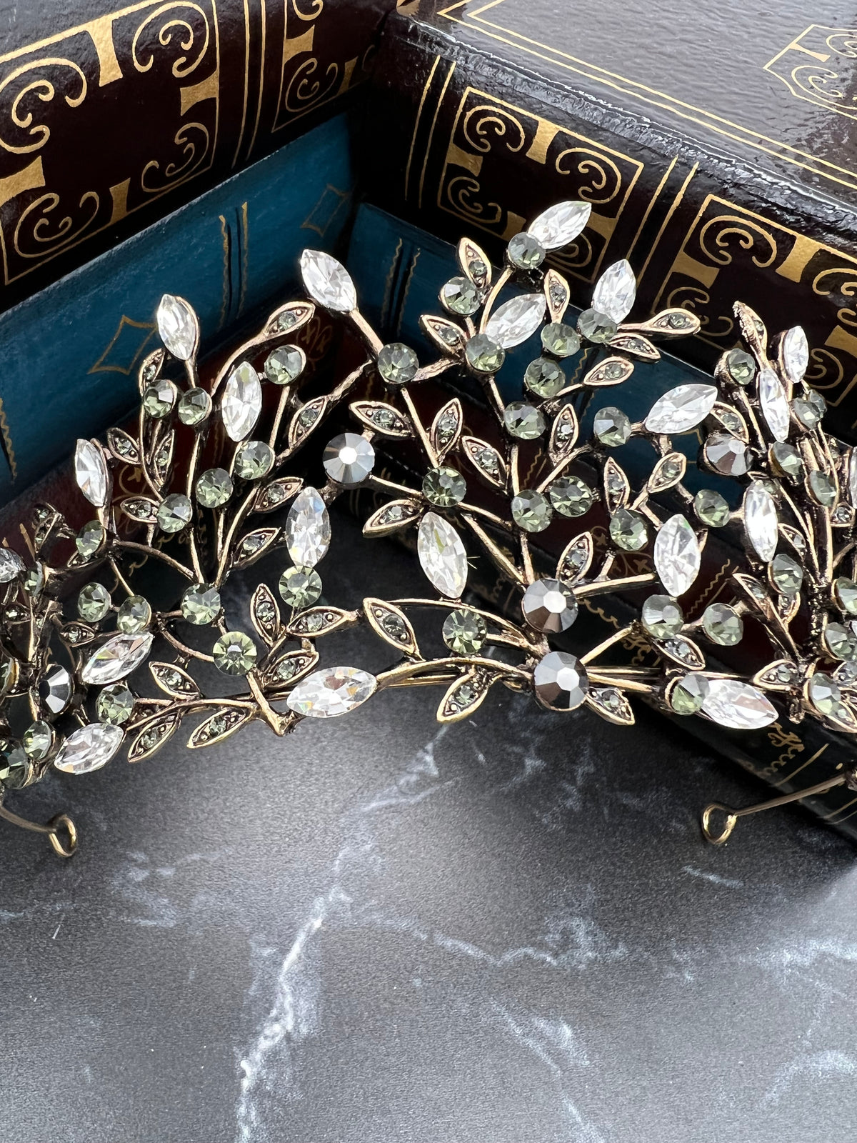 Antique Gold Finished metal with clear and gray crystals in vine design _Close up