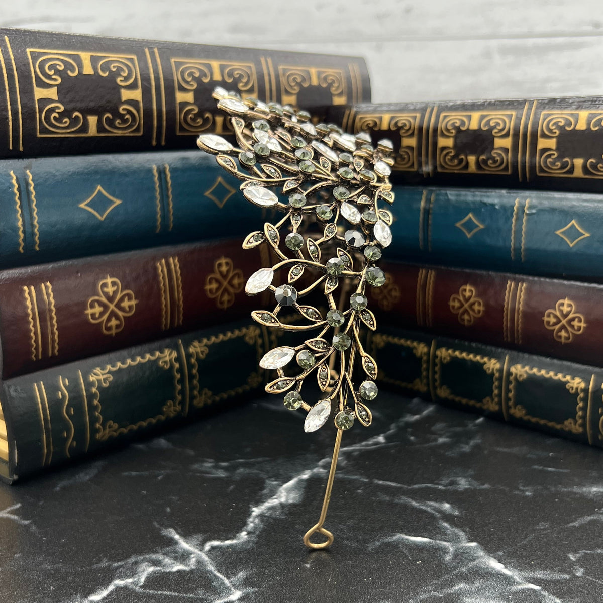 Antique Gold Finished metal with clear and gray crystals in vine design _Side
