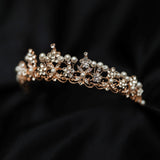 Amber's tiara in rose gold with pearl accents, flowers shaped with crystals - Angle View