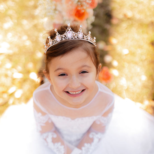 Modeled Cindy's Tiara Pink - Rose gold pink metal with 7 spikes with round clear crystals and oval pink crystals - First Communion Flower Girl