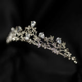 Posey's Tiara - Silver white gold color metal, clear crystal faux diamond, leaf and vine shaped metal, flower designs from crystals, small petite dainty - Angle View