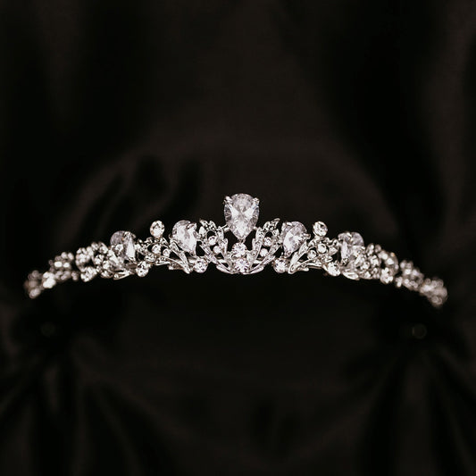 Sadie's Tiara - Petite Small Silver Tiara with Clear Crystals - One larger main crystal tear drop shape and two more tear drop shape crystals on either side, many small clear crystals throughout with leaf and vine metal detailing - Front 